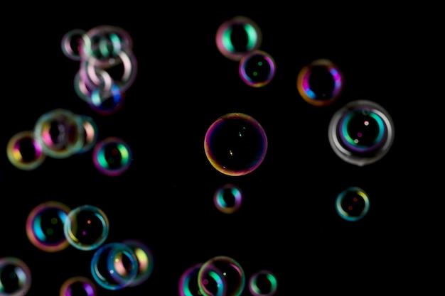 Free Photo bubbles on black background