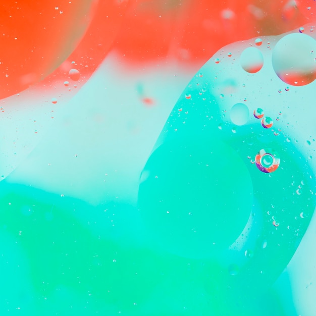 Bubbles effect on green and red textured background