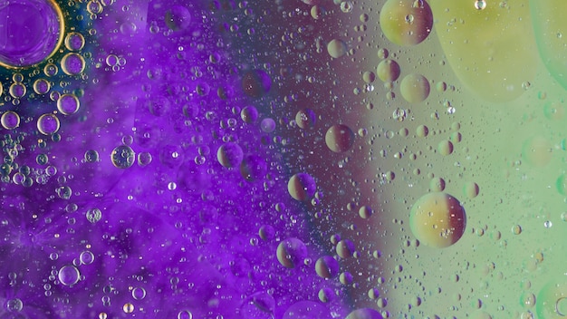 Free photo bubbles pattern over the purple background