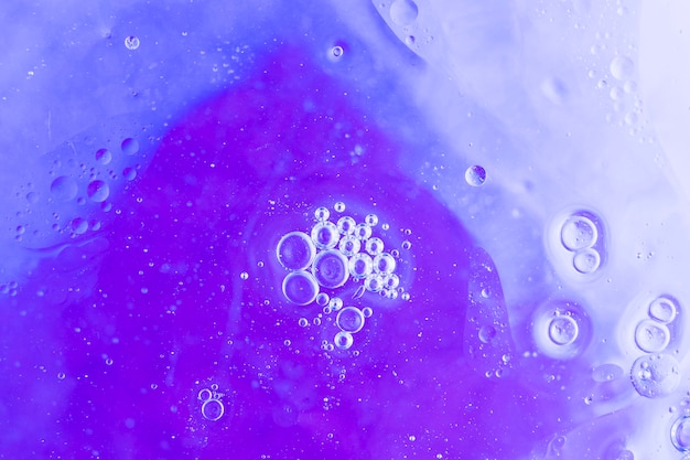 Free photo bubbles over the purple textured background