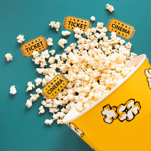 Free photo bucket full of popcorn and cinema tickets