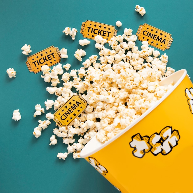 Free Photo bucket full of popcorn and cinema tickets