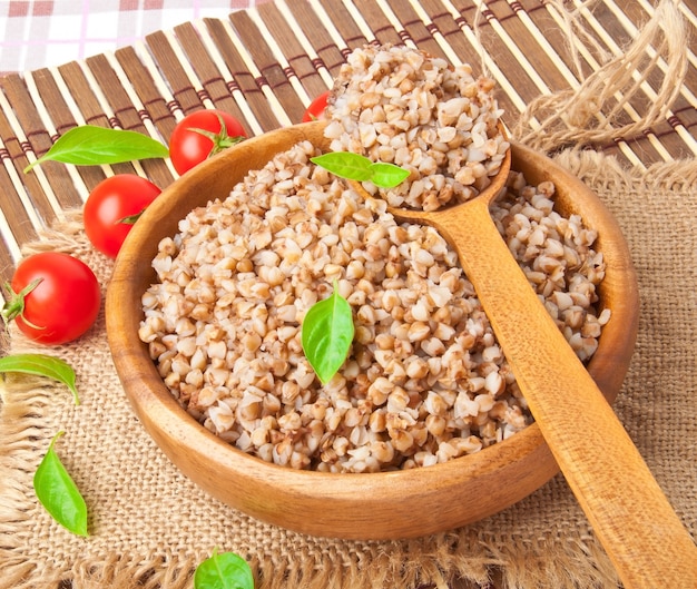 Buckwheat porridge in a wooden bowl