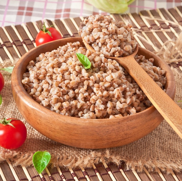 Buckwheat porridge in a wooden bowl