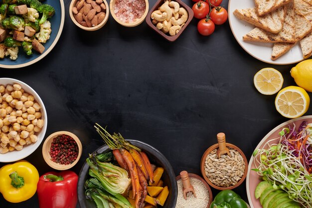 Buddha bowl dish with vegetables and legumes. Top view.