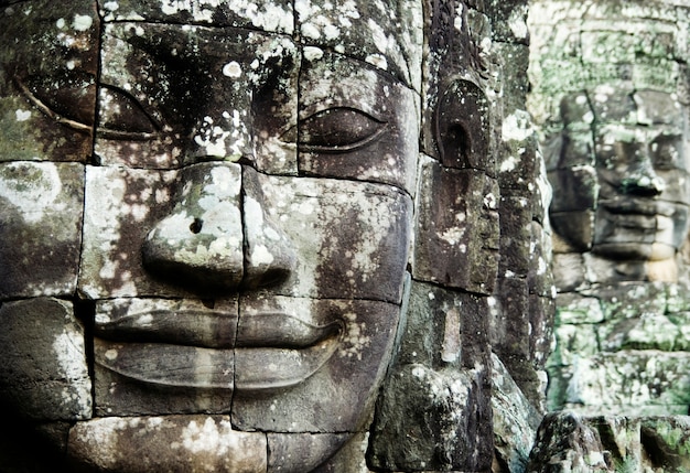 Free photo buddha faces at angkor thom, siem reap, cambodia