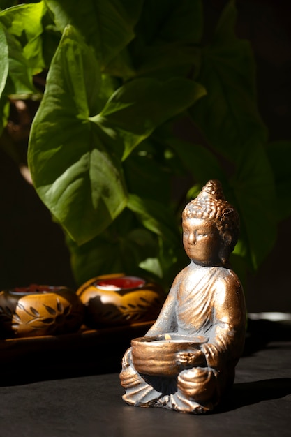 Free photo buddha figurine still life