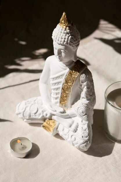 Free photo buddha figurine still life