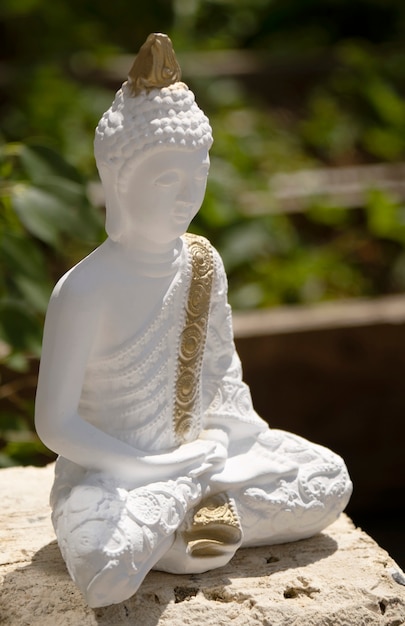 Free photo buddha figurine still life