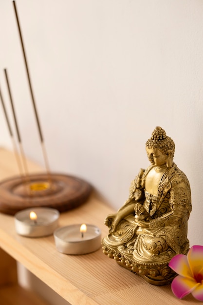 Free photo buddha figurine still life