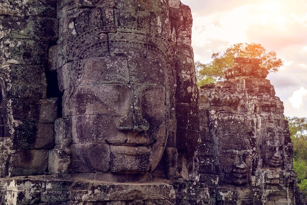 Free photo buddhist faces bayon temple, angkor wat in cambodia.