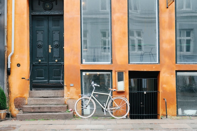 Free photo building exterior with parked bicycle