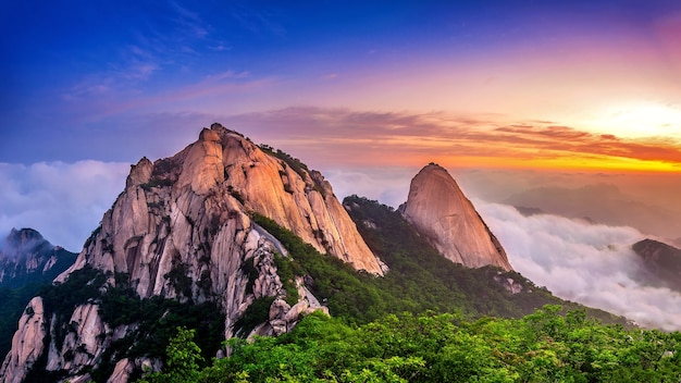 Bukhansan mountains is covered by morning fog and sunrise in Seoul,Korea