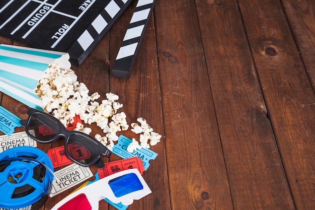 Bunch of cinema stuff on wooden tabletop