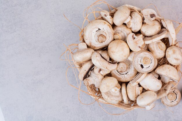 Bunch of fresh mushrooms in wooden basket