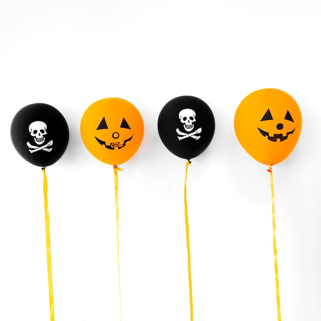 Free photo bunch of halloween balloons