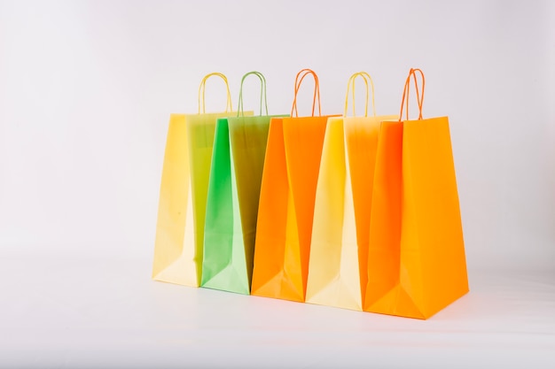 Bunch of paper bags standing in line