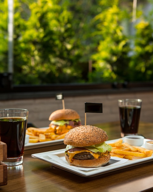 Free Photo burger menu for two pax with soft drinks.