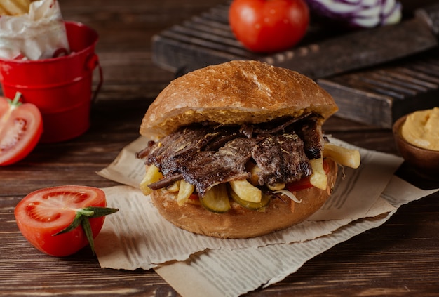 Burger with full of doner and french fries