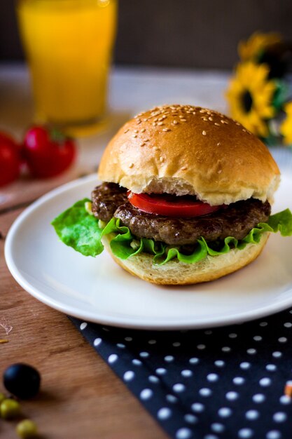 Burger with orange juice