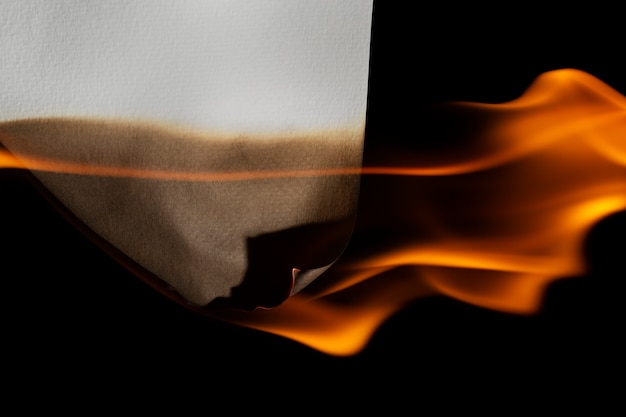 Free photo burning paper background still life