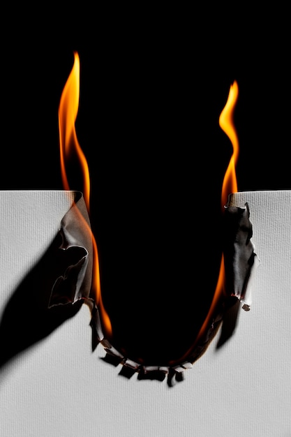 Free photo burning paper background still life