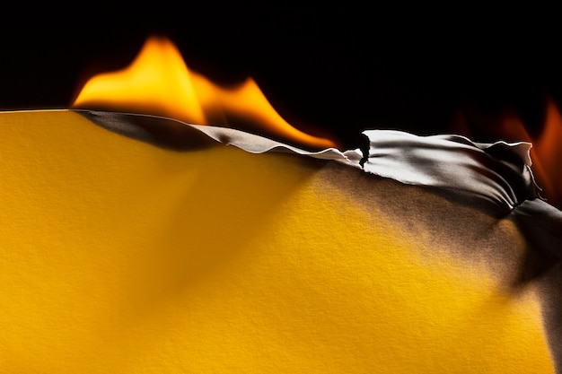 Free photo burning paper background still life