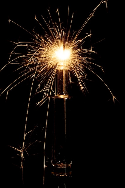 Burning sparkler in bottle