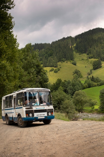 Bus in rural surroundings in daylight