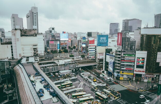 Bus terminal in the city with buildings