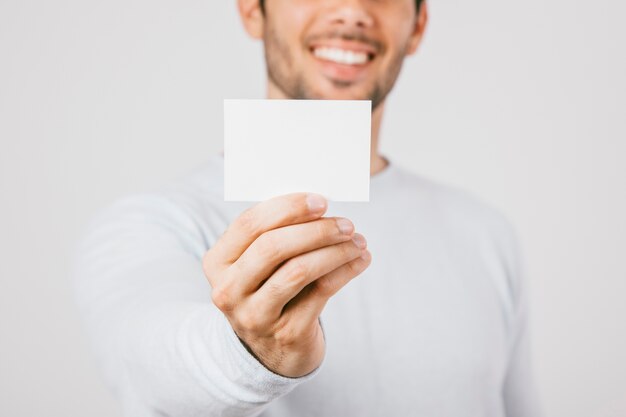 Business card template with young man at the background