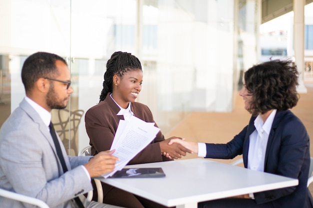 Business colleagues consulting legal advisor