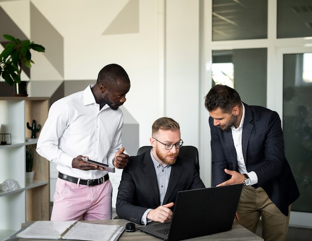 Free photo business employees working together