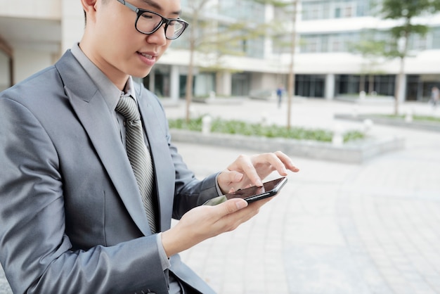 Business executive man texting