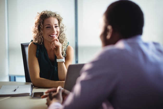 Business executives interacting with each other