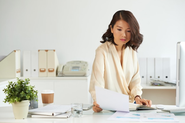 Business lady reading a contract