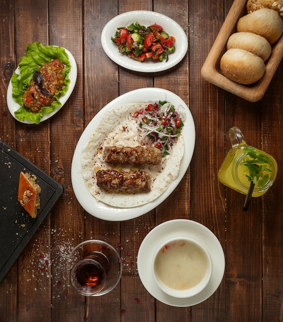 Business lunch with soup salad and lula kebab