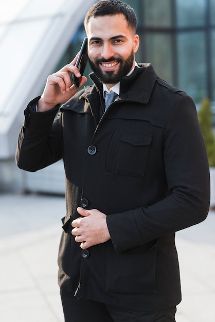 Free Photo business male talking over phone