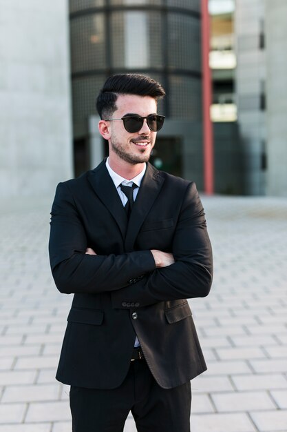 Business man in front of the office building