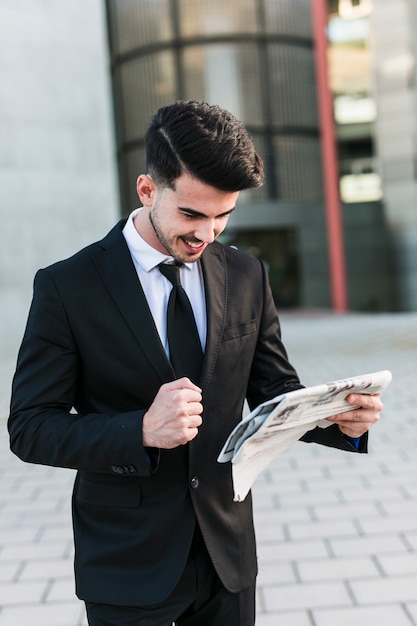 Business man in front of the office building