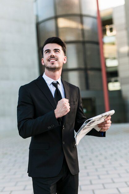 Business man in front of the office building