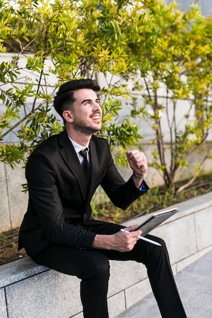 Business man using his tablet