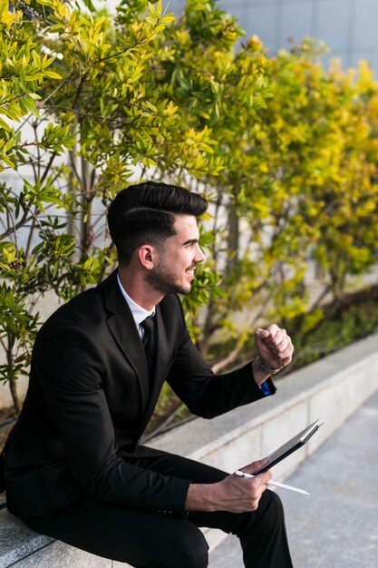 Business man using his tablet