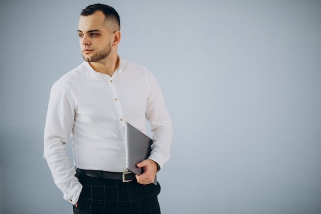 Business man using laptop in office