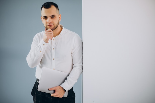 Business man using laptop in office