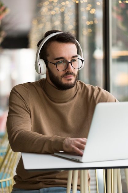 Business man with headphone working