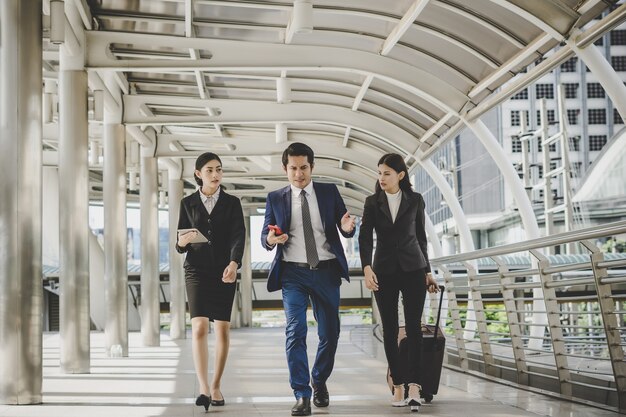 Business man and woman are going on business trip.