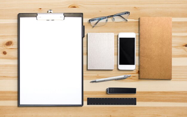 Business and marketing elements on wooden desk