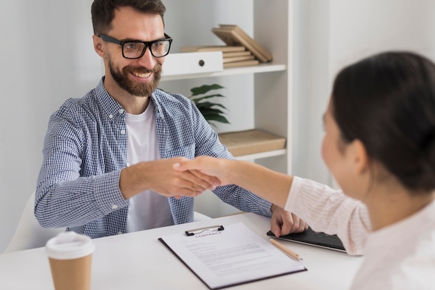 Business meeting with young male and woman