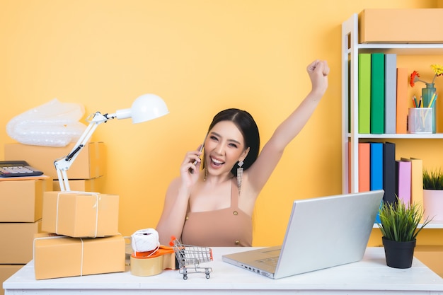 business owner working at home office packaging .